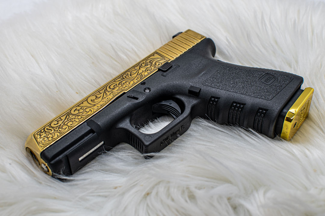 gold plated pistols