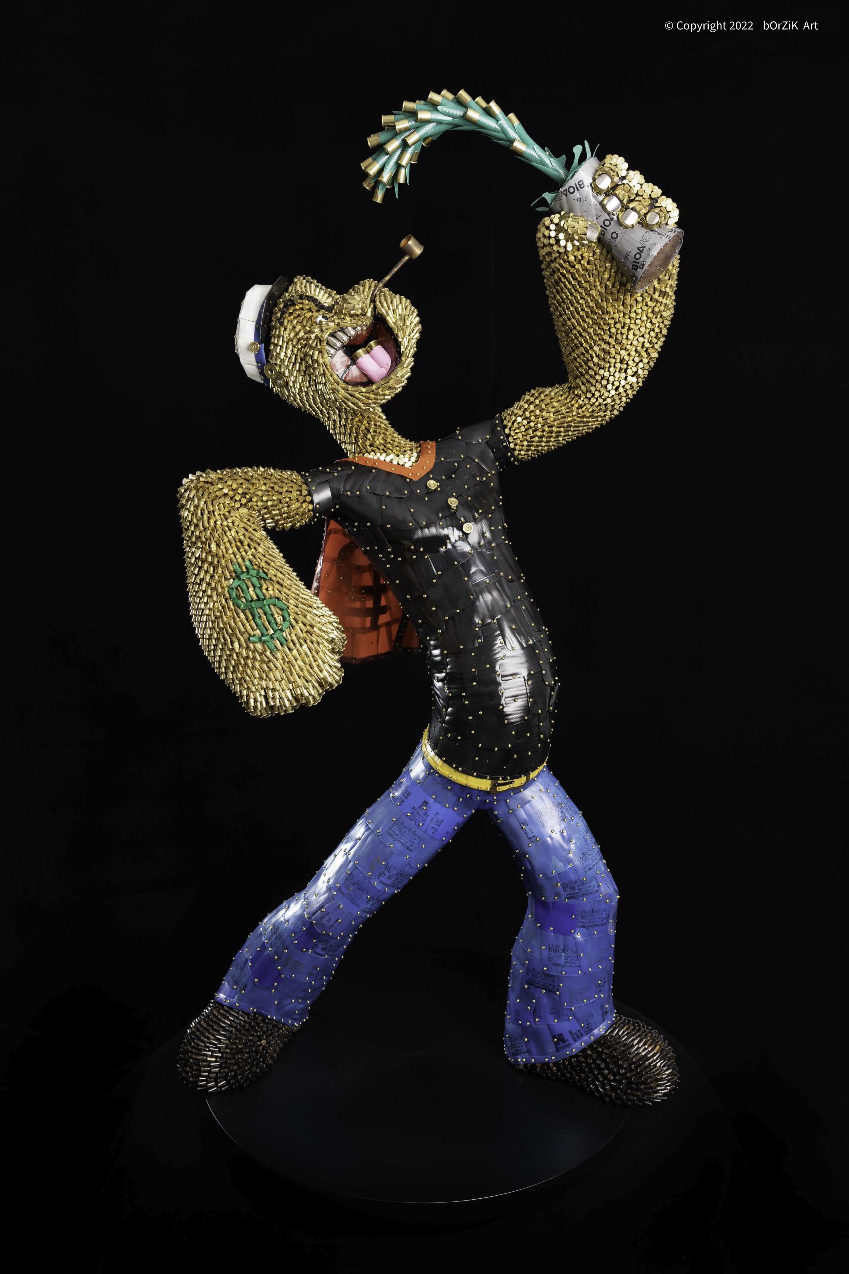 "Drunk on Power" is an intriguing sculpture that combines recycled bullet shells and the iconic character Popeye the Sailor Man. The use of bullet shells as the primary material challenges the conventional associations of violence and destruction with these objects, transforming them into a medium for artistic expression and social commentary.