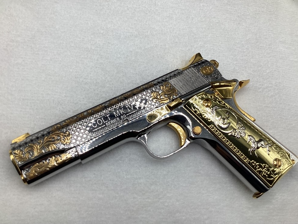 Colt MKIV 80 series 45 ACP with custom engravings, gold-plated parts, high polish nickel plating, custom grips with the Colt logo